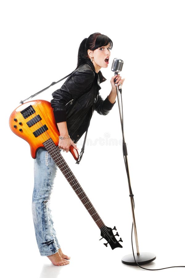 Rock-n-roll girl holding a guitar singing