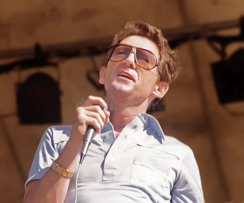 Rock and Roll Legend Jerry Lee Lewis performs at ChicagoFest on August 6, 1979.  Known as `The Killer,` the controversial, wild man was a musician as well as a pioneering singing artist known for his physical stage antics, particularly while playing the piano, in rockabilly, boogie-woogie, or a driving rock, intriguing style.  Two of his memorable hits are `Whole Lotta Shakin` Goin` On` and `Great Balls of Fire.`  Lewis is an inductee into the Rock and Roll Hall of Fame  and is the holder of 4 Grammys including a Lifetime Achievement Award.  Lewis died on October 28, 2022, at his home in DeSoto County, Mississippi, at the age of 87, with his 7th wife at his side. . Rock and Roll Legend Jerry Lee Lewis performs at ChicagoFest on August 6, 1979.  Known as `The Killer,` the controversial, wild man was a musician as well as a pioneering singing artist known for his physical stage antics, particularly while playing the piano, in rockabilly, boogie-woogie, or a driving rock, intriguing style.  Two of his memorable hits are `Whole Lotta Shakin` Goin` On` and `Great Balls of Fire.`  Lewis is an inductee into the Rock and Roll Hall of Fame  and is the holder of 4 Grammys including a Lifetime Achievement Award.  Lewis died on October 28, 2022, at his home in DeSoto County, Mississippi, at the age of 87, with his 7th wife at his side.