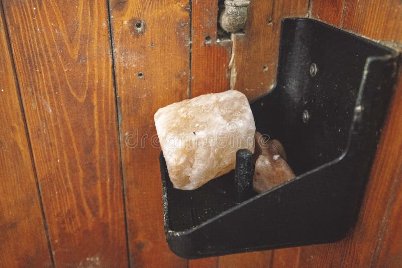 Rock Salt for the Horse on a Shelf Inside the Horse Stable Stock Image