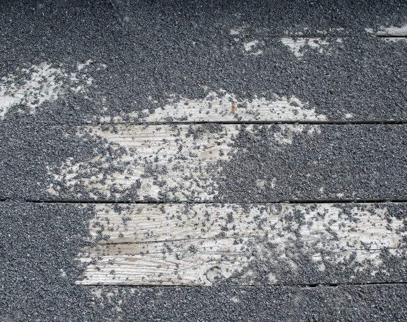 Rock texture on wooden slat