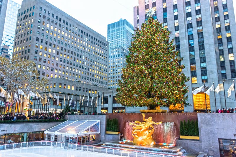 NEW YORK-DECEMBER 7: The world famous Rockefeller Christmas tree, ice skating rink and surrounding buildings on December 7 2015 in New York City. NEW YORK-DECEMBER 7: The world famous Rockefeller Christmas tree, ice skating rink and surrounding buildings on December 7 2015 in New York City.