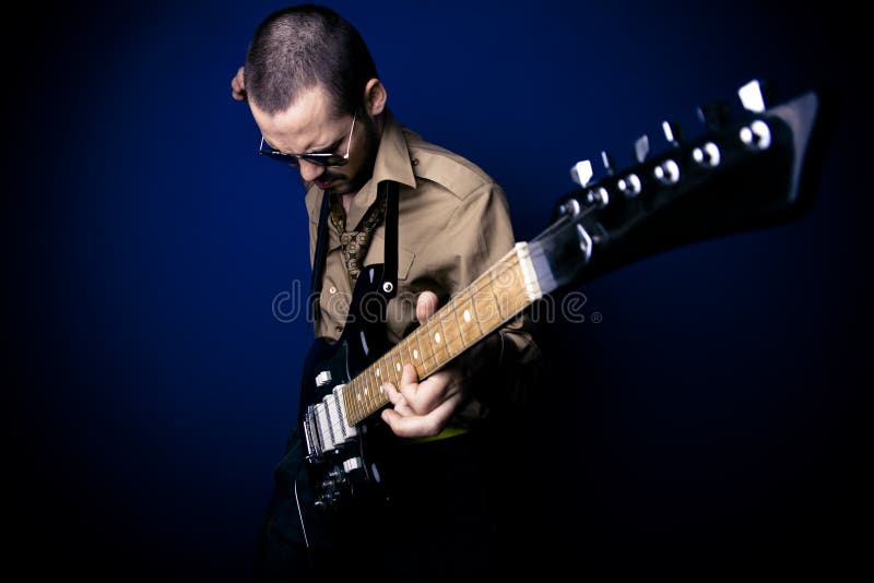 Rocker playing guitar
