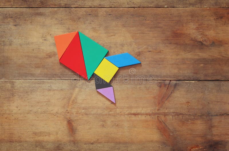 Rocket made from tangram puzzle stock image