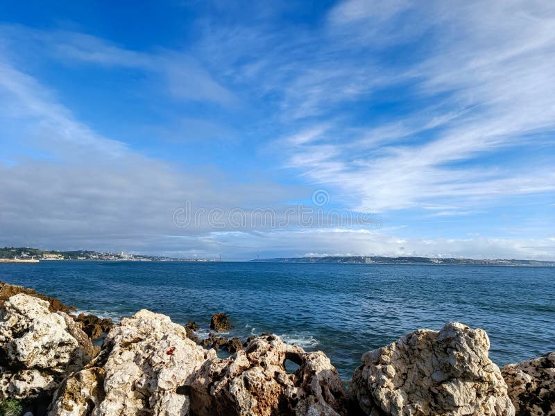 rocks on the beach with cloudy sky. rocks on the beach with cloudy sky