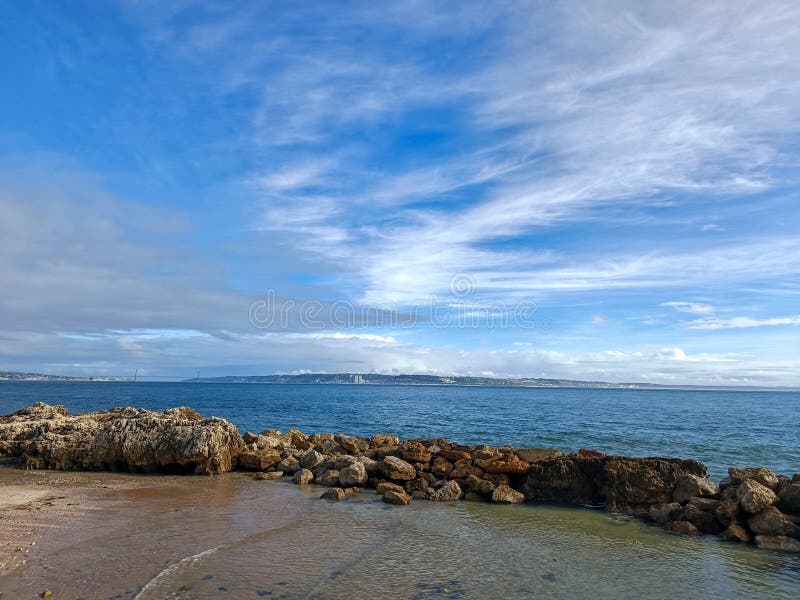 rocks on the beach with cloudy sky. rocks on the beach with cloudy sky