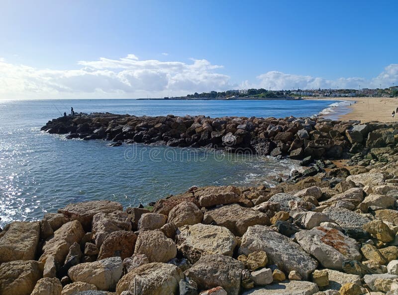 rocks on the beach with cloudy sky. rocks on the beach with cloudy sky