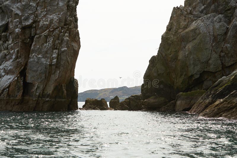 Rocks Covered with Moss on the Sea Island Coast. Stock Photo Image of