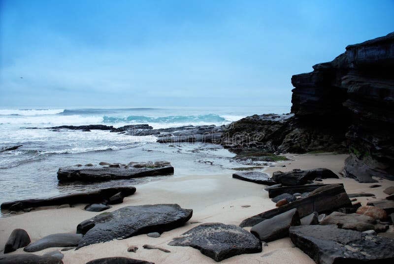 Rocks, Ocean, Beach and Sky