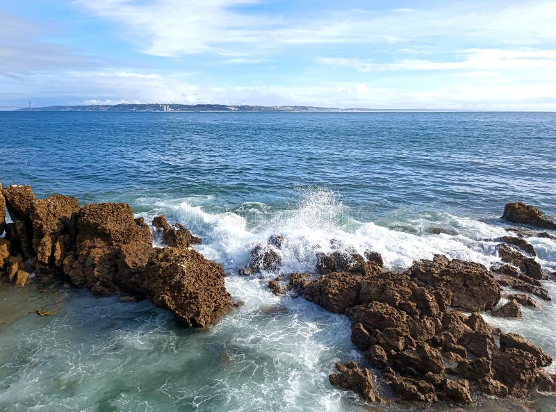 rocks on the beach with cloudy sky. rocks on the beach with cloudy sky