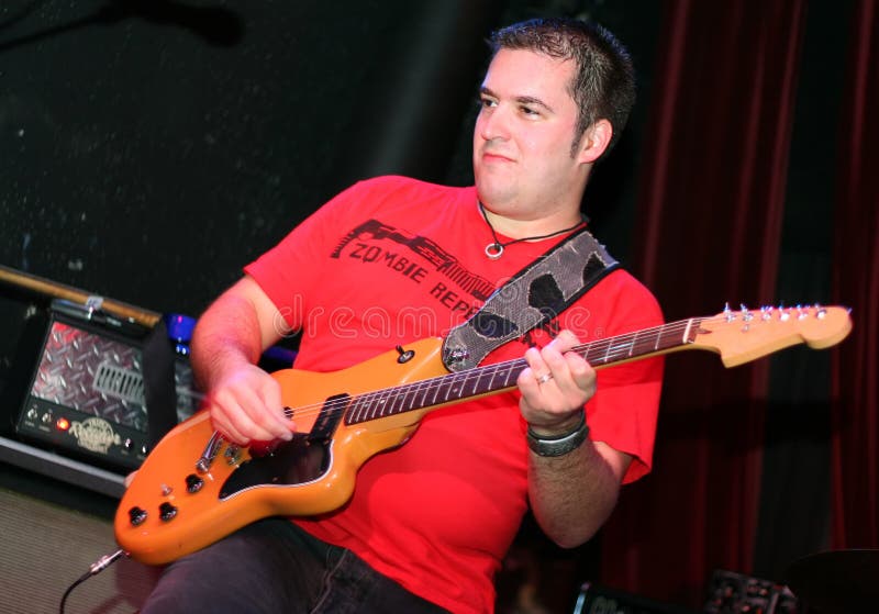 Rockstar Playing Guitar On Stage Stock Image Image 1948351