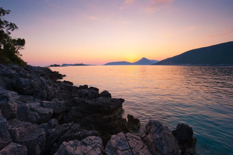 Rocky beach landscape sunset in Montenegro