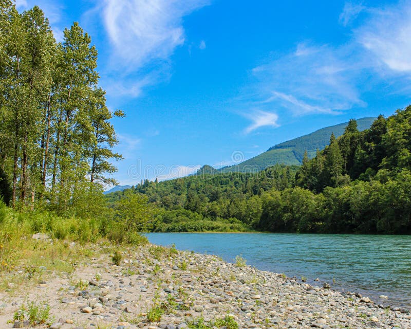 Rocky beach trail along the Skagit River at Rasar State Park, Washington.