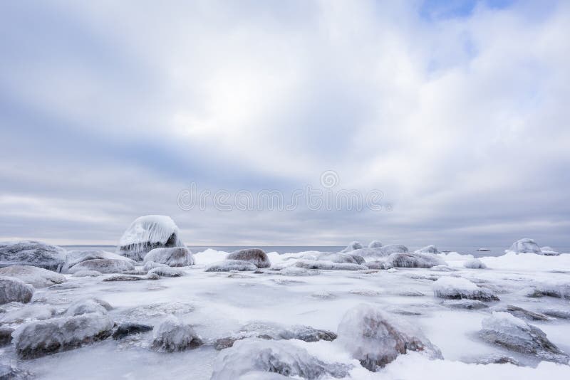 Evening light and icy weather on shore like fairy tale country.