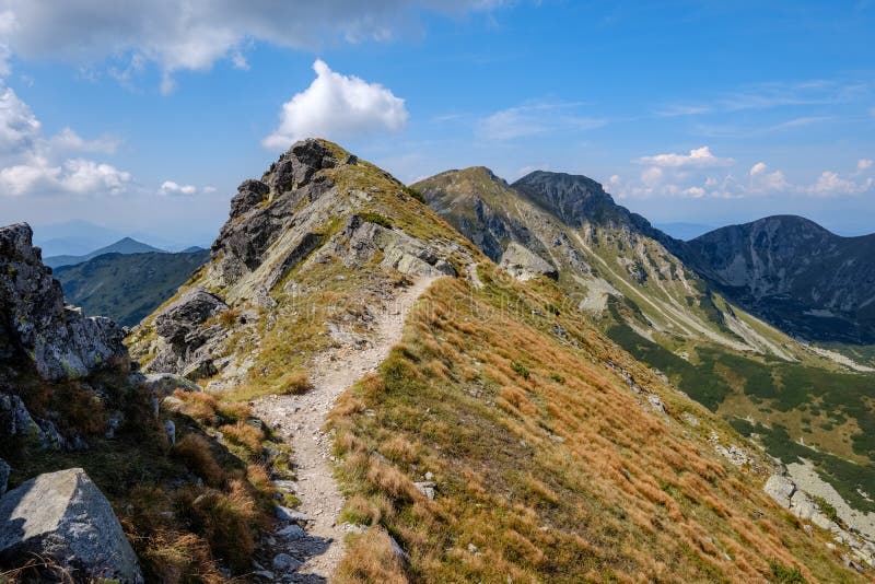 Rocky mountain tops with hiking trails in autumn in Slovakian Ta