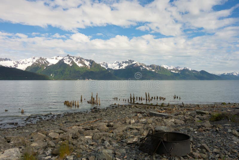 The rocky mountains as seen at low tide in alaska