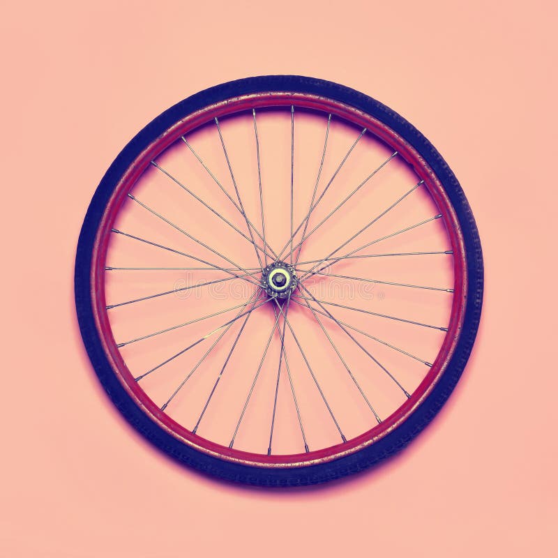 Roda de bicicleta da foto do moderno do vintage fotografia de stock Roda de bicicleta da foto do moderno do vintage fotografia de stock