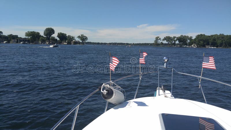 Boating on lake on the fourth of July on Lake Minnetonka. Boating on lake on the fourth of July on Lake Minnetonka