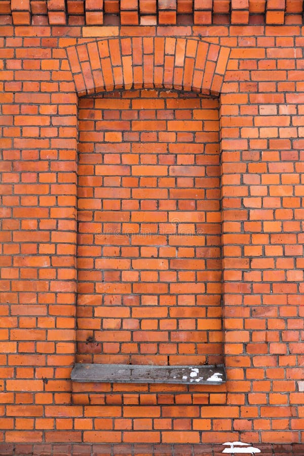 Rode bakstenen muur en een venster stock fotografie Rode bakstenen muur en een venster stock fotografie