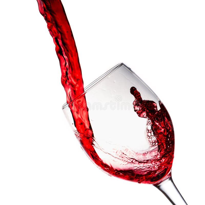 Red wine poured into wine glass,white background. Red wine poured into wine glass,white background