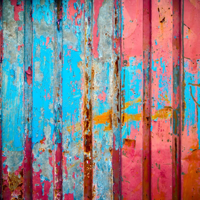 Texture of old grunge red and blue color paint on metal wall. Texture of old grunge red and blue color paint on metal wall