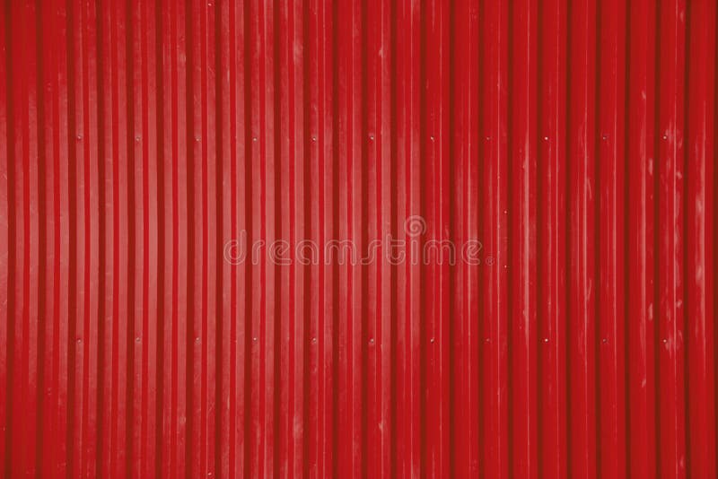 Rode gegolfde metalen plaat textuur als achtergrond stock foto's