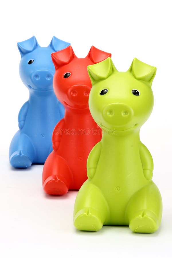 Rode, groene en blauwe spaarvarkens royalty-vrije stock foto's