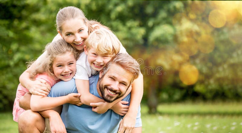 Parents and children as happy family hugging in spring. Parents and children as happy family hugging in spring