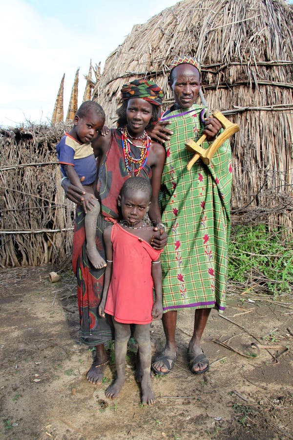 SOUTH OMO - ETHIOPIA - NOVEMBER 25, 2011: Unidentified family of the Dasanech tribe, in November 25, 2011 in Omo Rift Valley, Ethiopia. SOUTH OMO - ETHIOPIA - NOVEMBER 25, 2011: Unidentified family of the Dasanech tribe, in November 25, 2011 in Omo Rift Valley, Ethiopia.