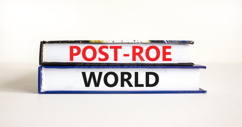 Roe vs Wade post-Roe world symbol. Concept words Post-Roe world on books on a beautiful white table white background. Business and