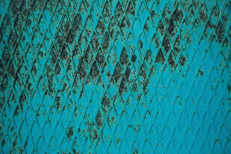 Behang met een getextureerd roestig metalen paneel stock fotografie