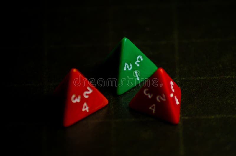Role Playing Game triangular dices. Selective focus. board game concept