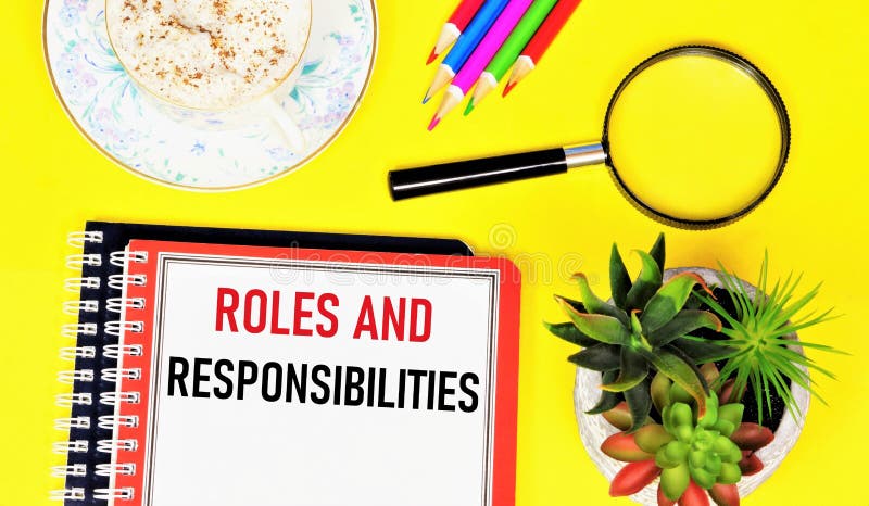 Roles and responsibilities. Text label in the planning notebook. stock photo
