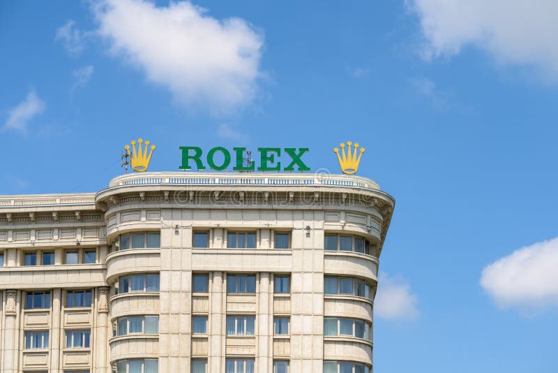 Rolex Företag tecken på byggnad royaltyfri foto Rolex Företag tecken på byggnad royaltyfri foto