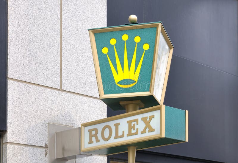 Rolex Logo on the wall royalty free stock images