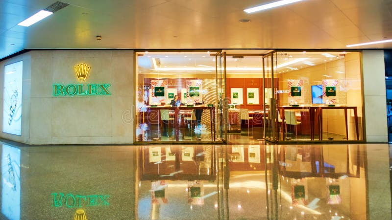 Rolex watch shop front editorial stock 