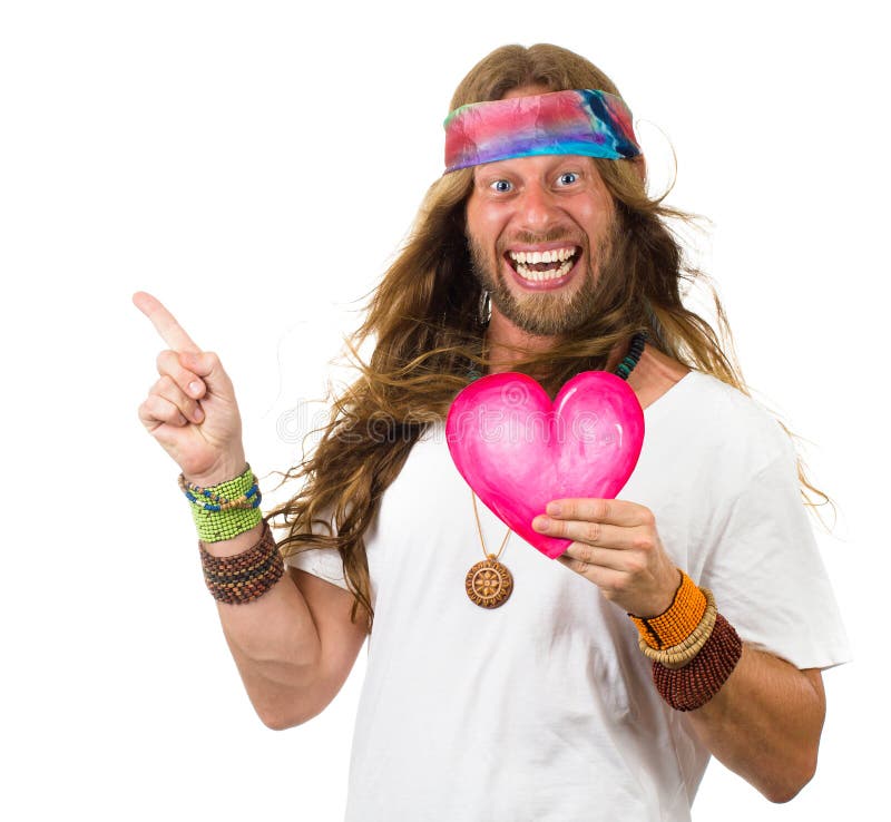 Rolig hippieman som rymmer en hjärta och peka för förälskelse royaltyfri bild Rolig hippieman som rymmer en hjärta och peka för förälskelse royaltyfri bild