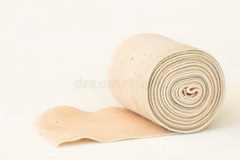 Roll Bandage for First Aid Accident on Background White Stock Photo