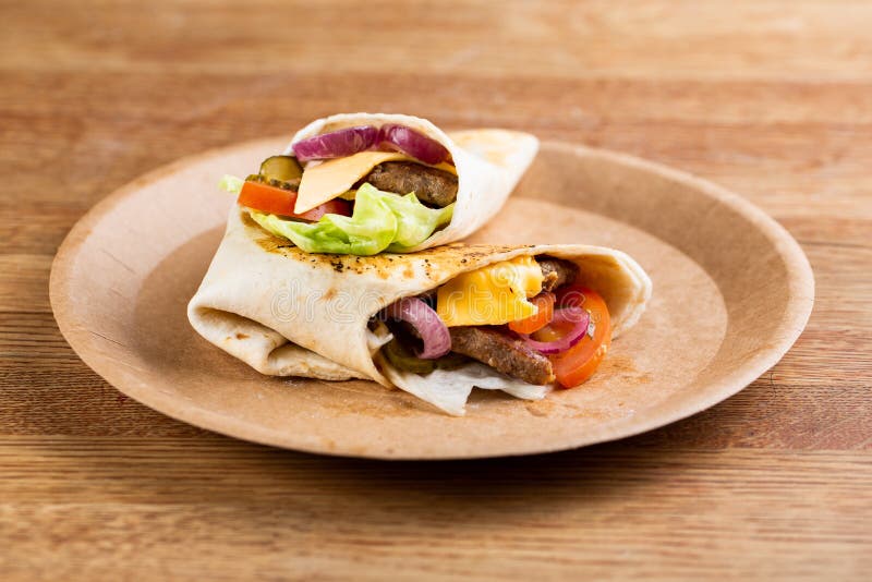 Roll with Beef Patty with Fresh Vegetables and Cheese Stock Image