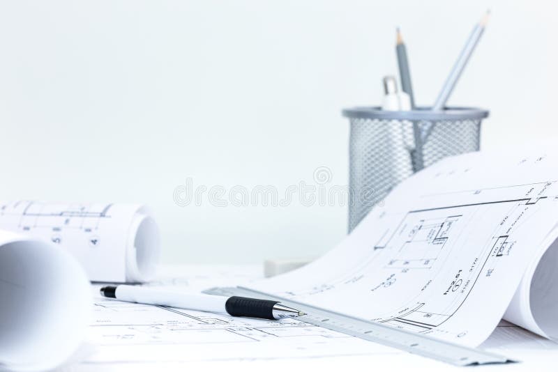 roll blueprints with technical plans, engineering tools on architect workplace desk royalty free stock photo roll blueprints with technical plans, engineering tools on architect workplace desk royalty free stock photo