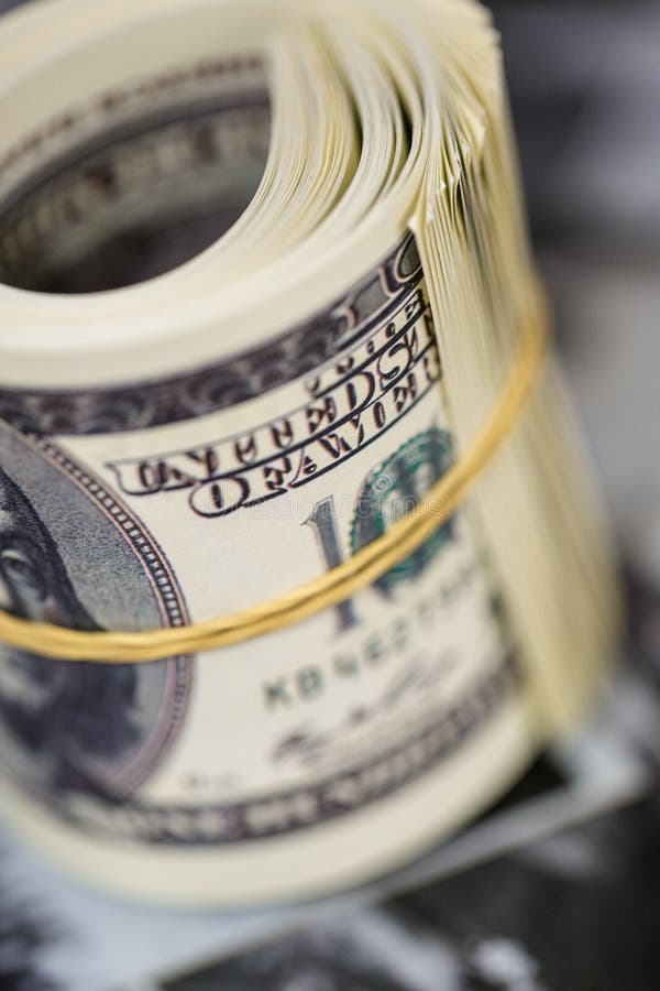 Roll a Hundred Dollar Bill. American Money Banknote Stock Photo Image