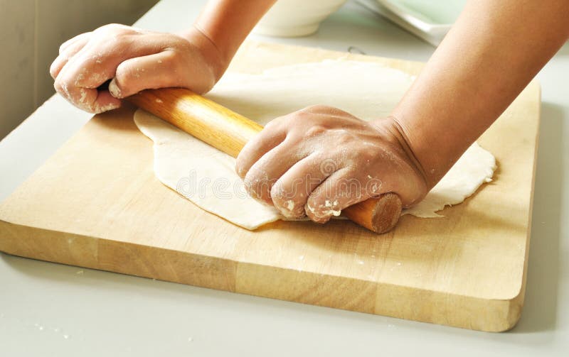 Roll Out Dough with Rolling Pin Stock Image - Image of closeup, cook