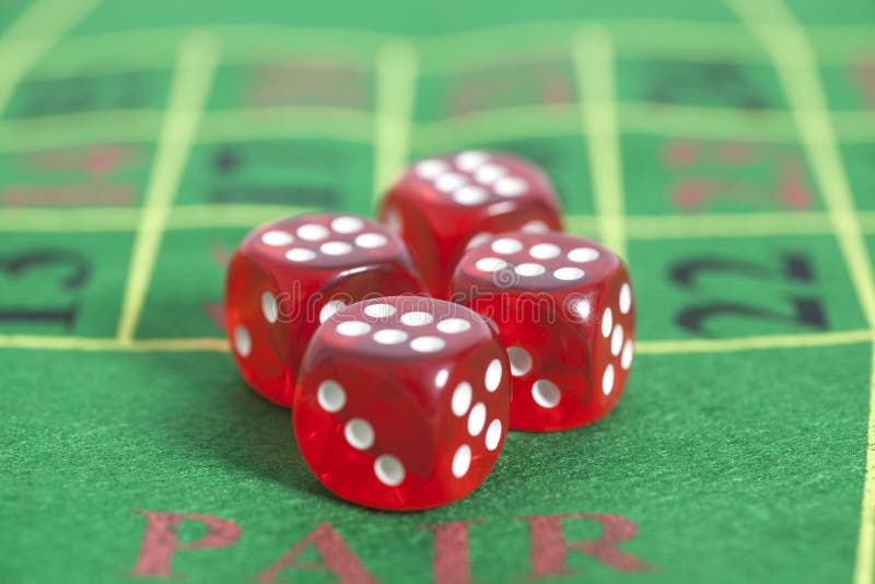 Roll of the Red Dice on a Game Table in a Casino Stock Photo Image of
