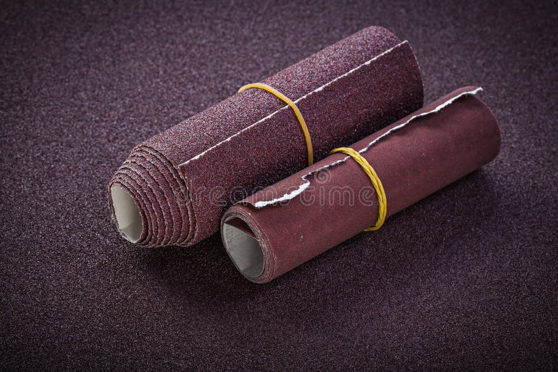 Rolled emery paper top view abrasive tools royalty free stock images