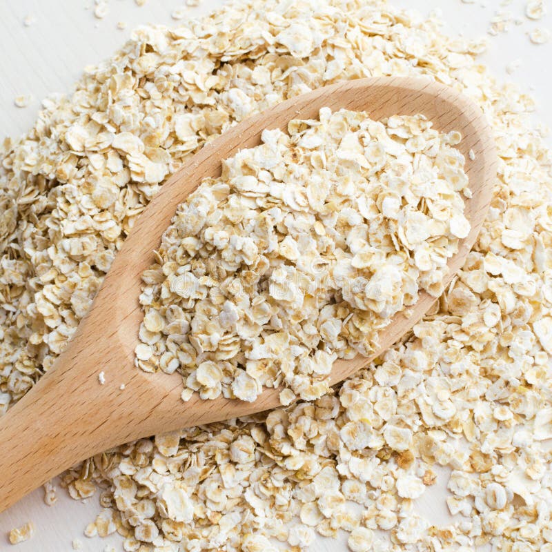 Rolled oats in big spoon stock photo. Image of closeup - 116264850