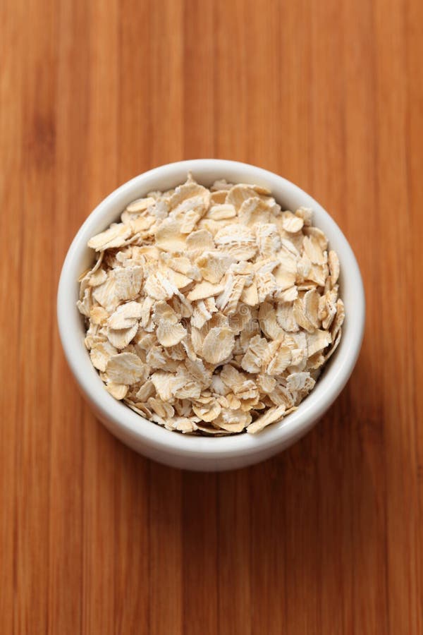 Oats in bowl stock photo. Image of focus, spilling, organic - 45081242