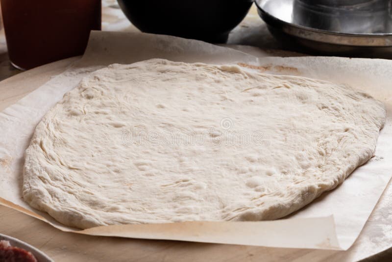 Rolled Out Pizza Dough on Baking Paper Stock Image Image of bakery