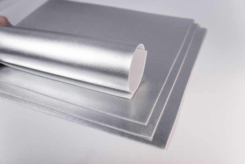 Rolled Silver Sheet of Cardboard. Sheets of Shiny Isolon. Metallic Paper  Stock Image - Image of cards, design: 245612225