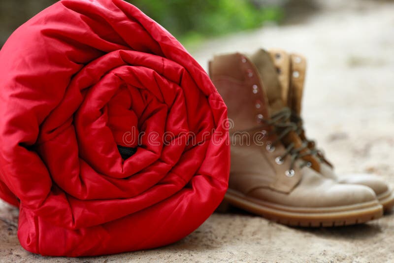 Rolled Sleeping Bag and Boots Stock Image Image of rest, sand 160384691