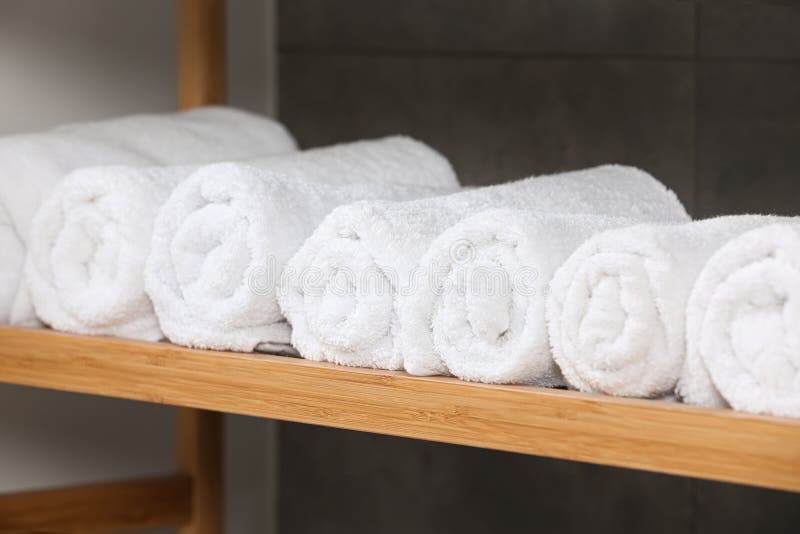 https://thumbs.dreamstime.com/b/rolled-soft-terry-towels-wooden-shelf-indoors-closeup-rolled-soft-terry-towels-wooden-shelf-indoors-262876384.jpg
