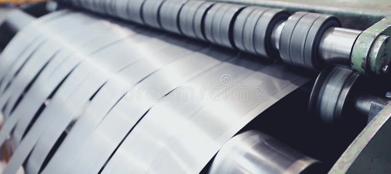 Rolled steel. Stack of rolls, cold rolled steel coils in action stock photo